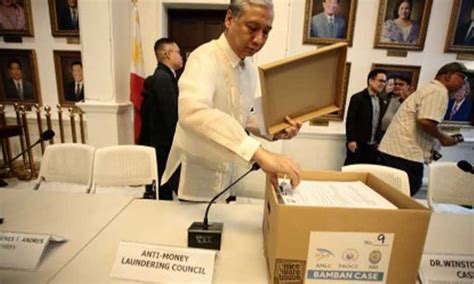 nbi tarlac photos|Guo, 35 others charged with money laundering before DOJ.